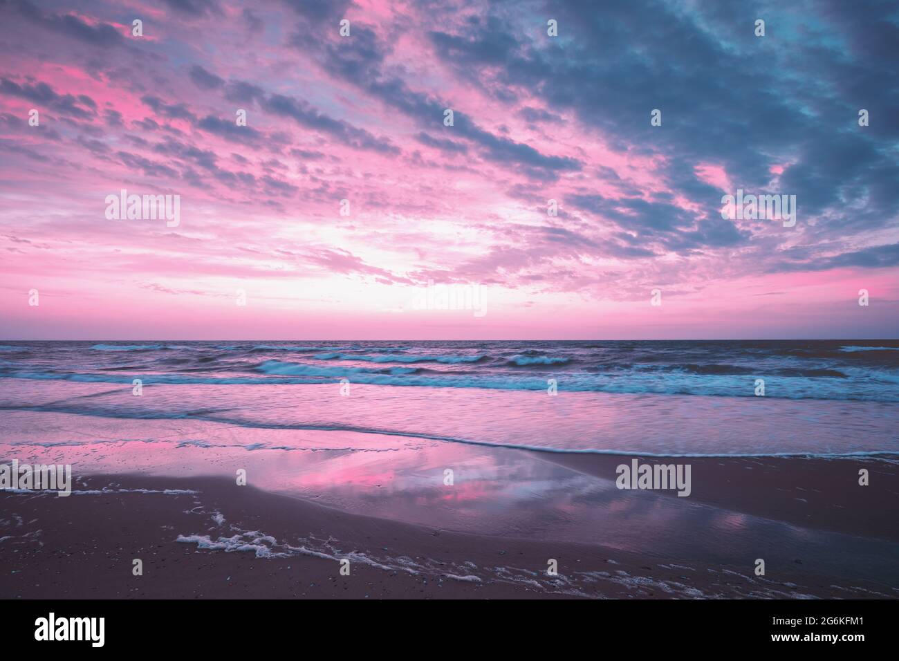 Seascape in the evening. Sunset over the sea with the beautiful cloudy ...