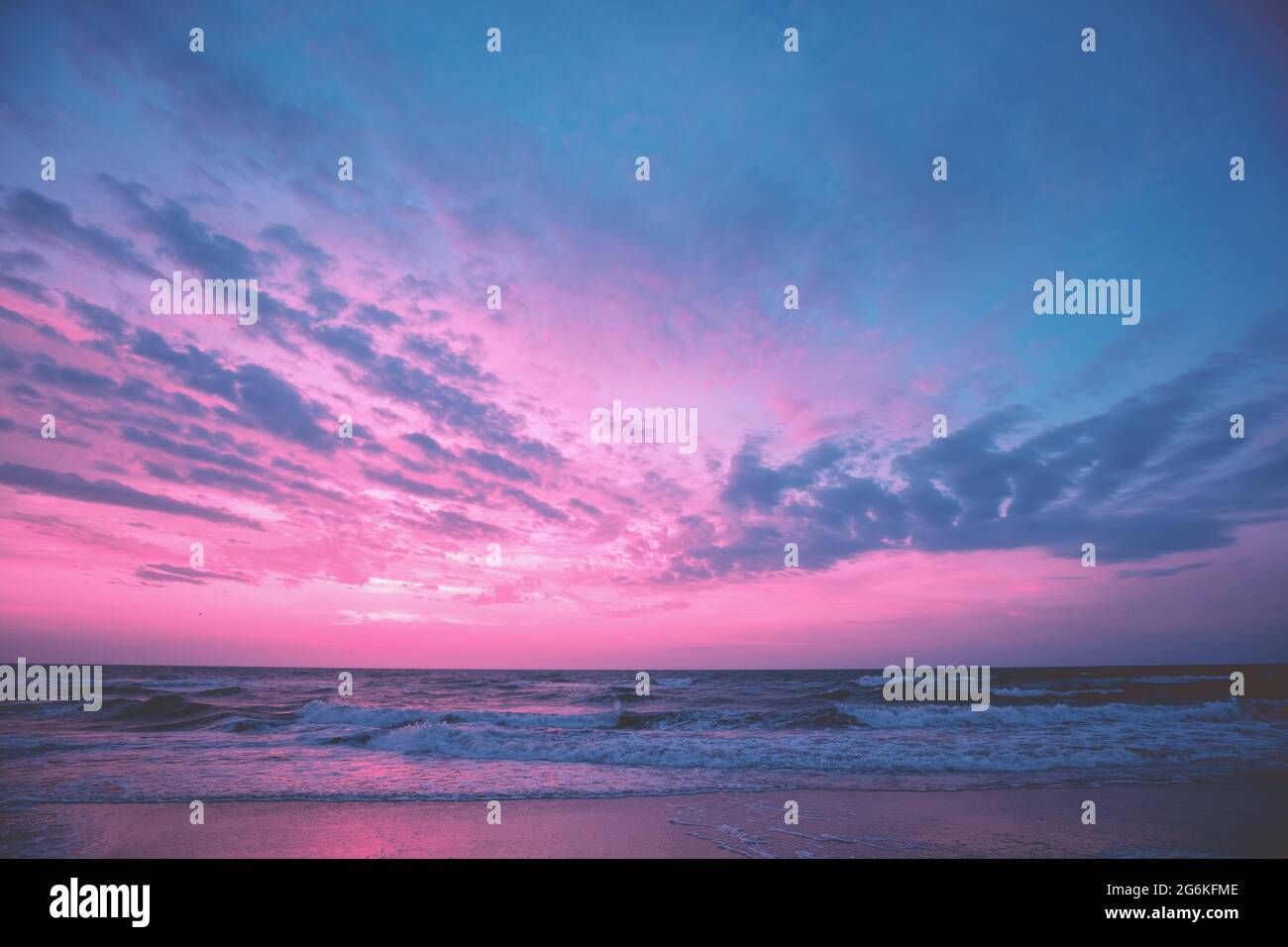 Seascape in the evening. Sunset over the sea with the beautiful cloudy ...