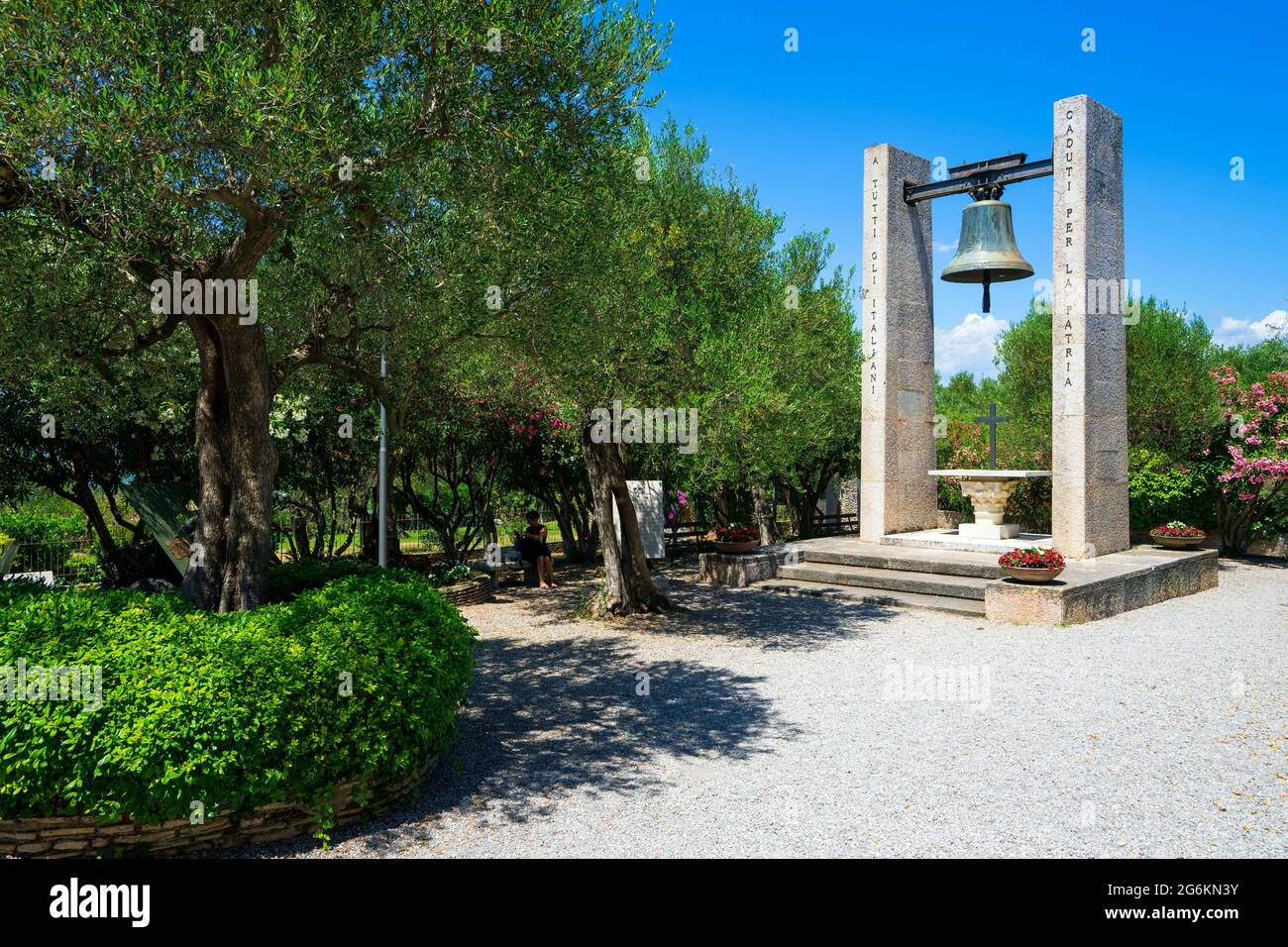 Memorial and bell of the chapel of San Pietro in Mavino in the city of Sirmione at Garda Lake in Italy Stock Photo