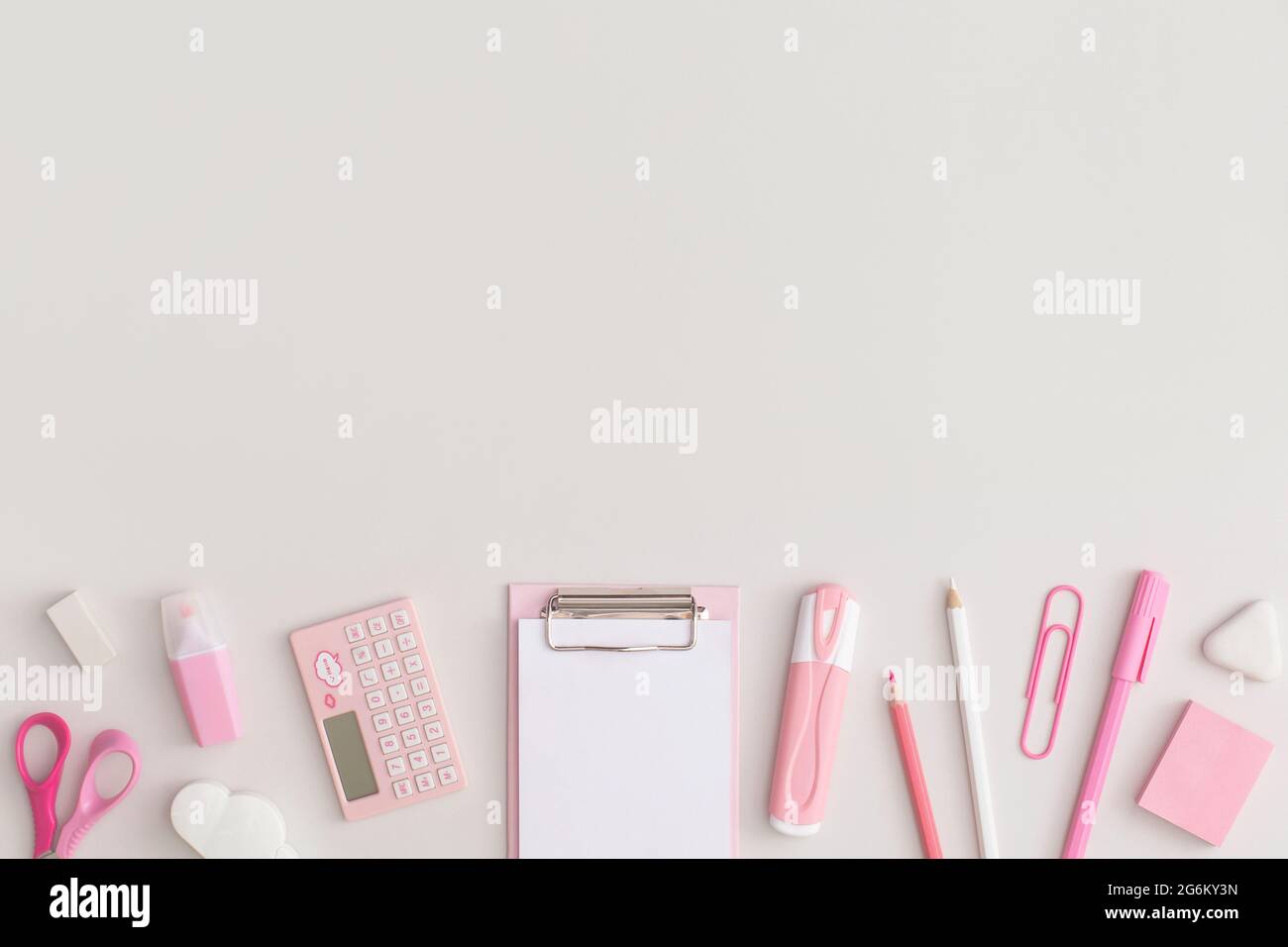 Pink school stationery on a grey background. Top view. Flat lay. Back ...