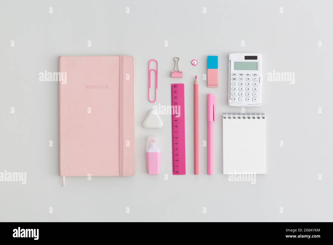 School stationery on a grey background. Top view. Flat lay. Back to ...