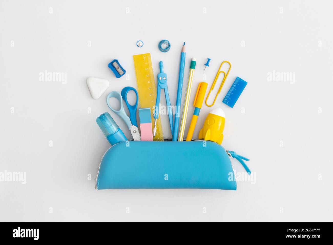 Pencil case with school stationery on a grey background. Top view. Flat lay. Back to school concept. Stock Photo