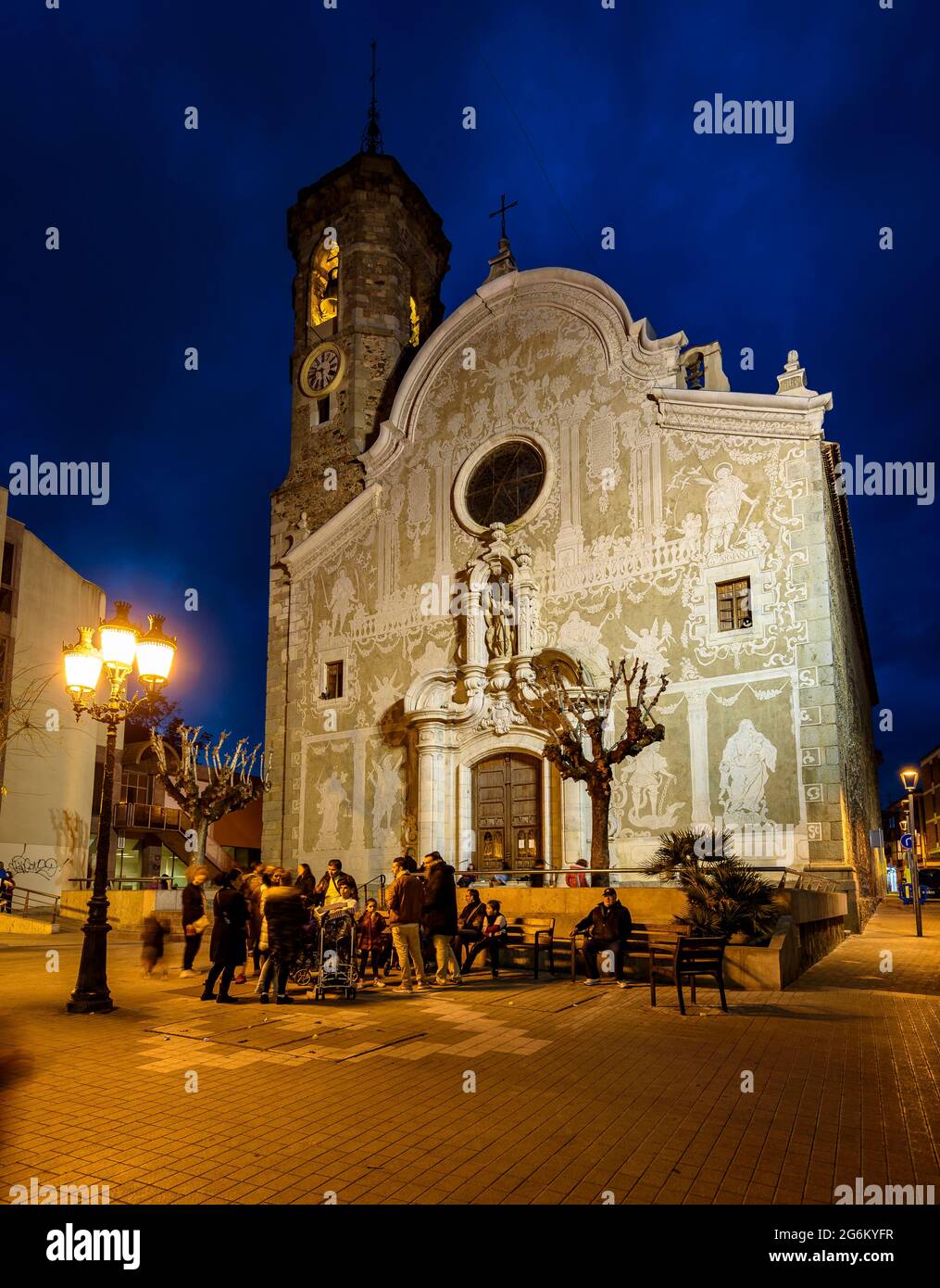 Sgraffito facade of the Sant Celoni church at the evening blue hour (Vallès Oriental, Barcelona, Catalonia, Spain) Stock Photo