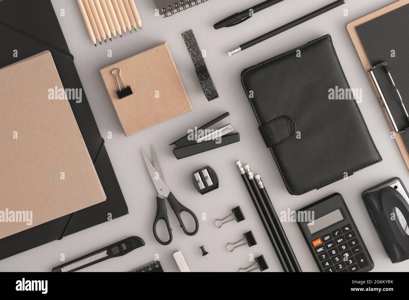 Pattern composition of office and school stationery on grey background. Back to school Stock Photo