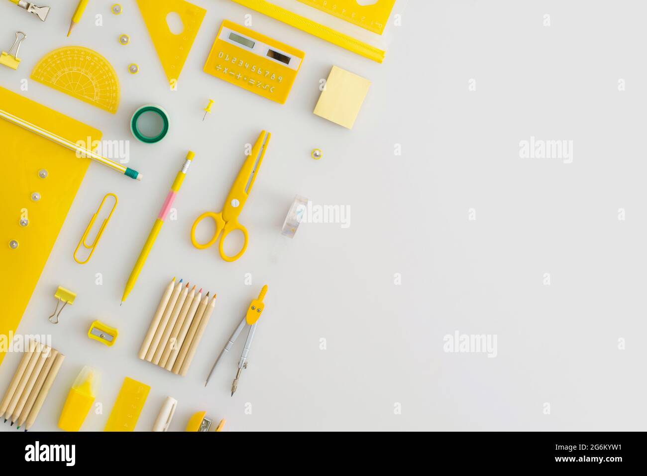 School stationery on a grey background. Top view. Flat lay. Back to ...