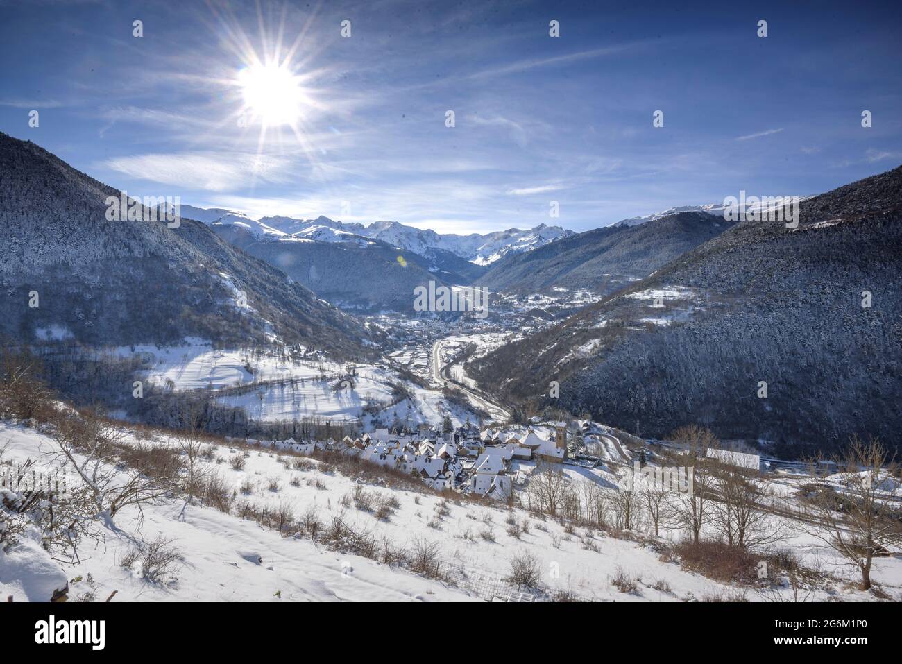 Vielha and Mijaran valley seen from the village of Mont, after a winter snowfall (Aran Valley, Catalonia, Spain, Pyrenees) Stock Photo