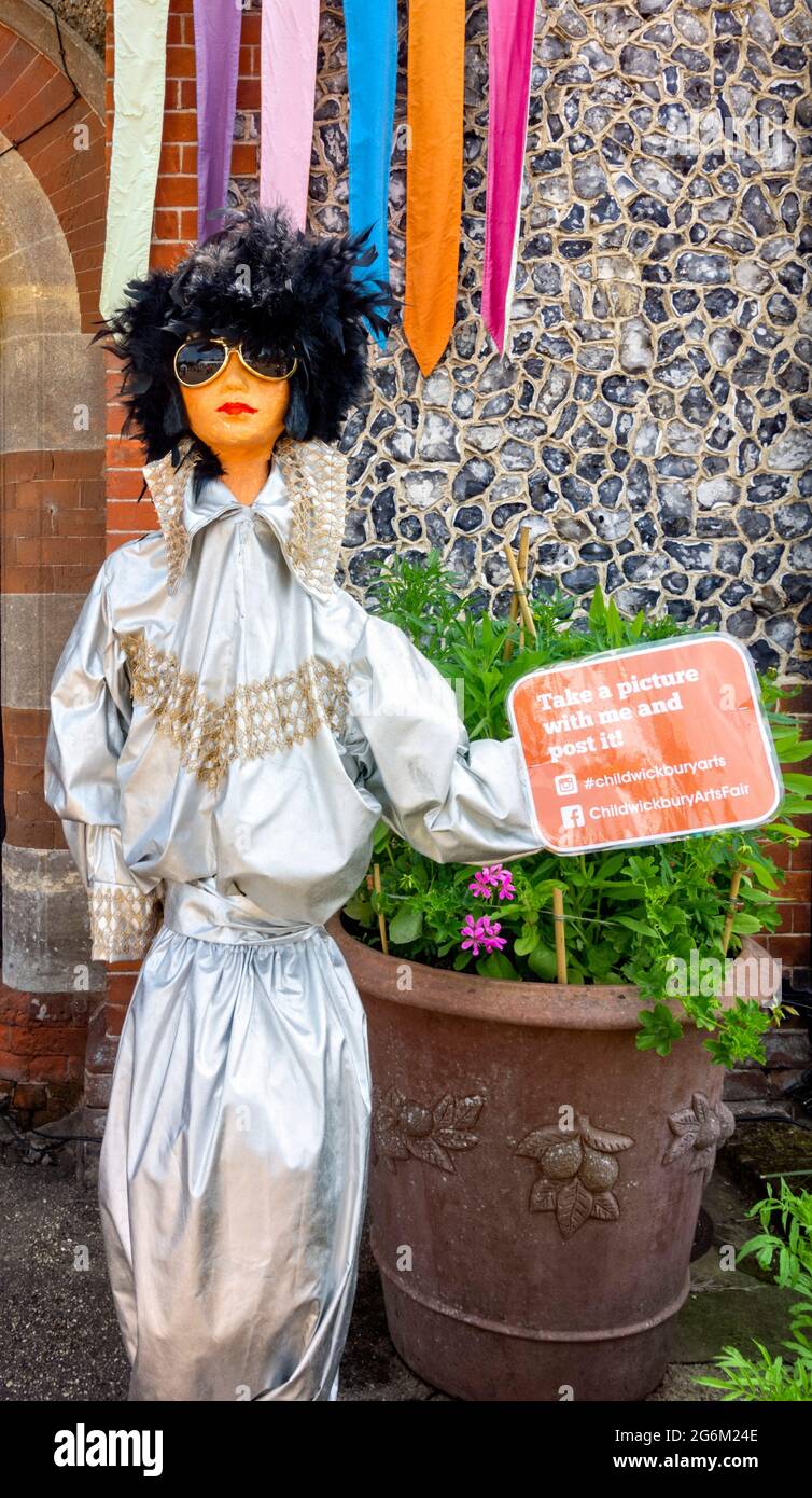 Mannequin Signs Colourful mannequin holding information sign Stock Photo - Alamy