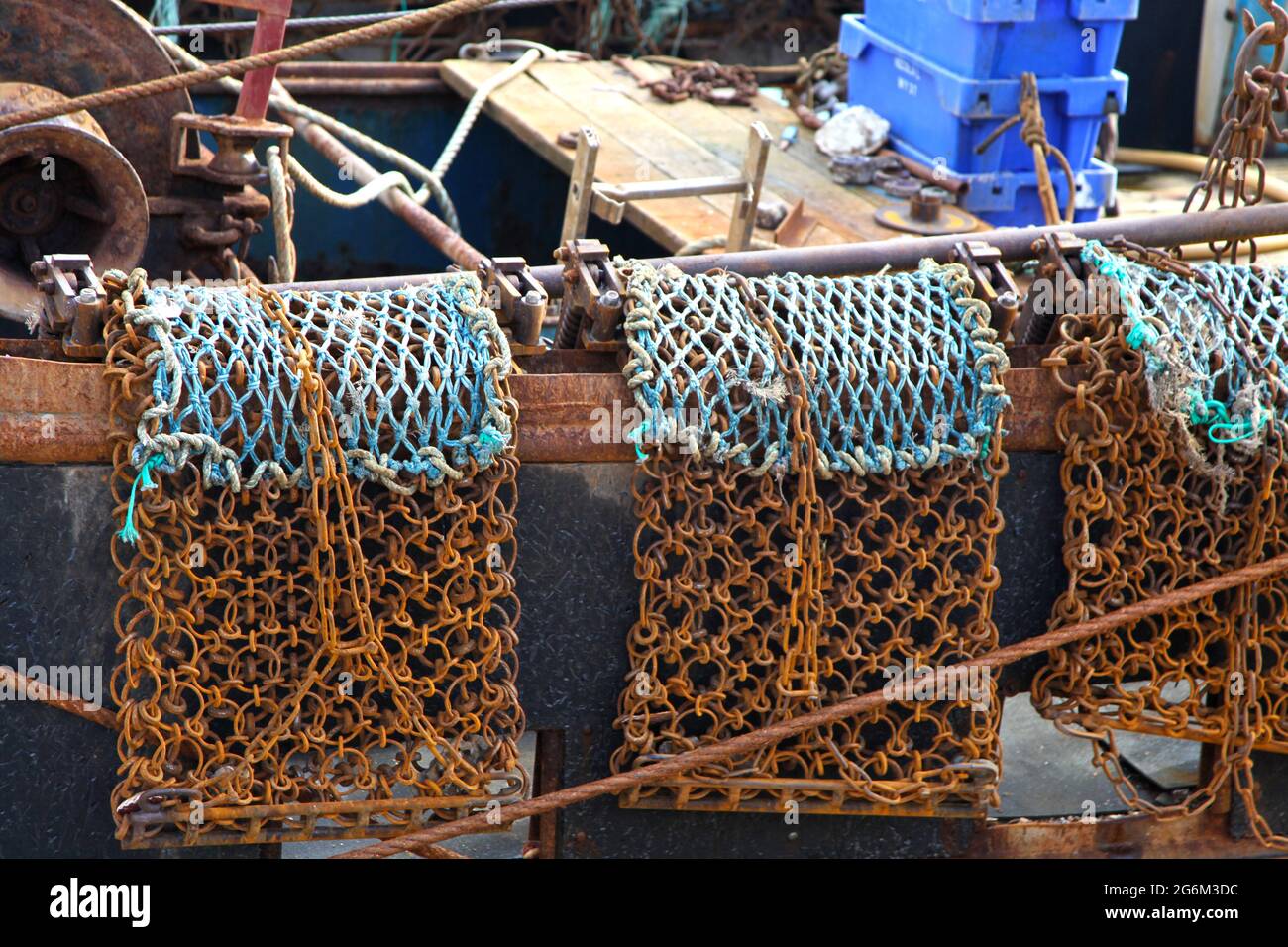 Clam or scallop drag nets on a fishing boat at Weymouth Harbour in Dorset, England Stock Photo