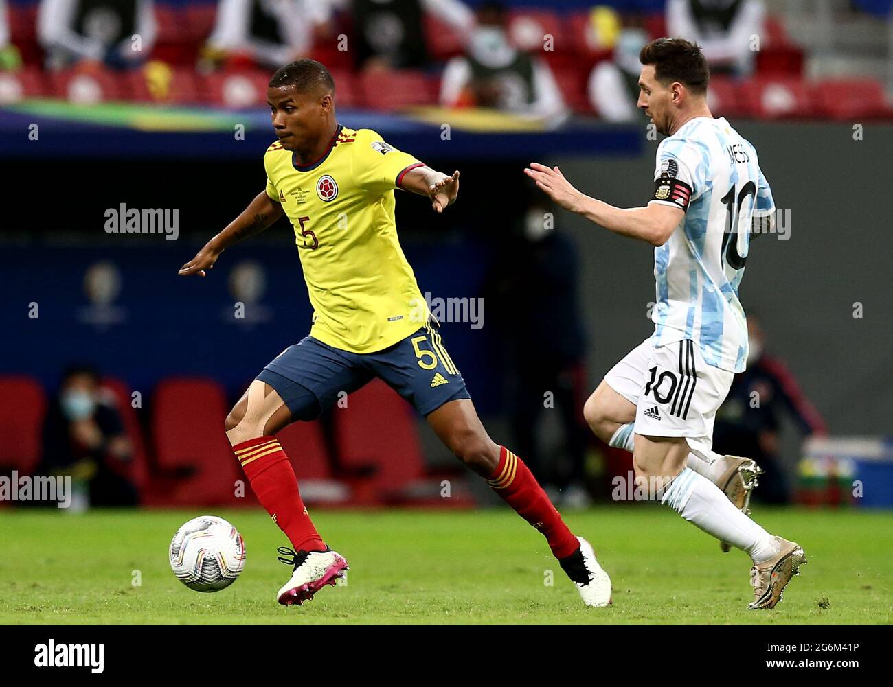 BRASILIA, BRAZIL - JULY 06: Wilmar Barrios of Colombia competes for the ball with Lionel Messi of Argentina ,during the Semifinal match between Argentina and Colombia as part of Conmebol Copa America Brazil 2021 at Mane Garrincha Stadium on July 6, 2021 in Brasilia, Brazil. (MB Media) Stock Photo