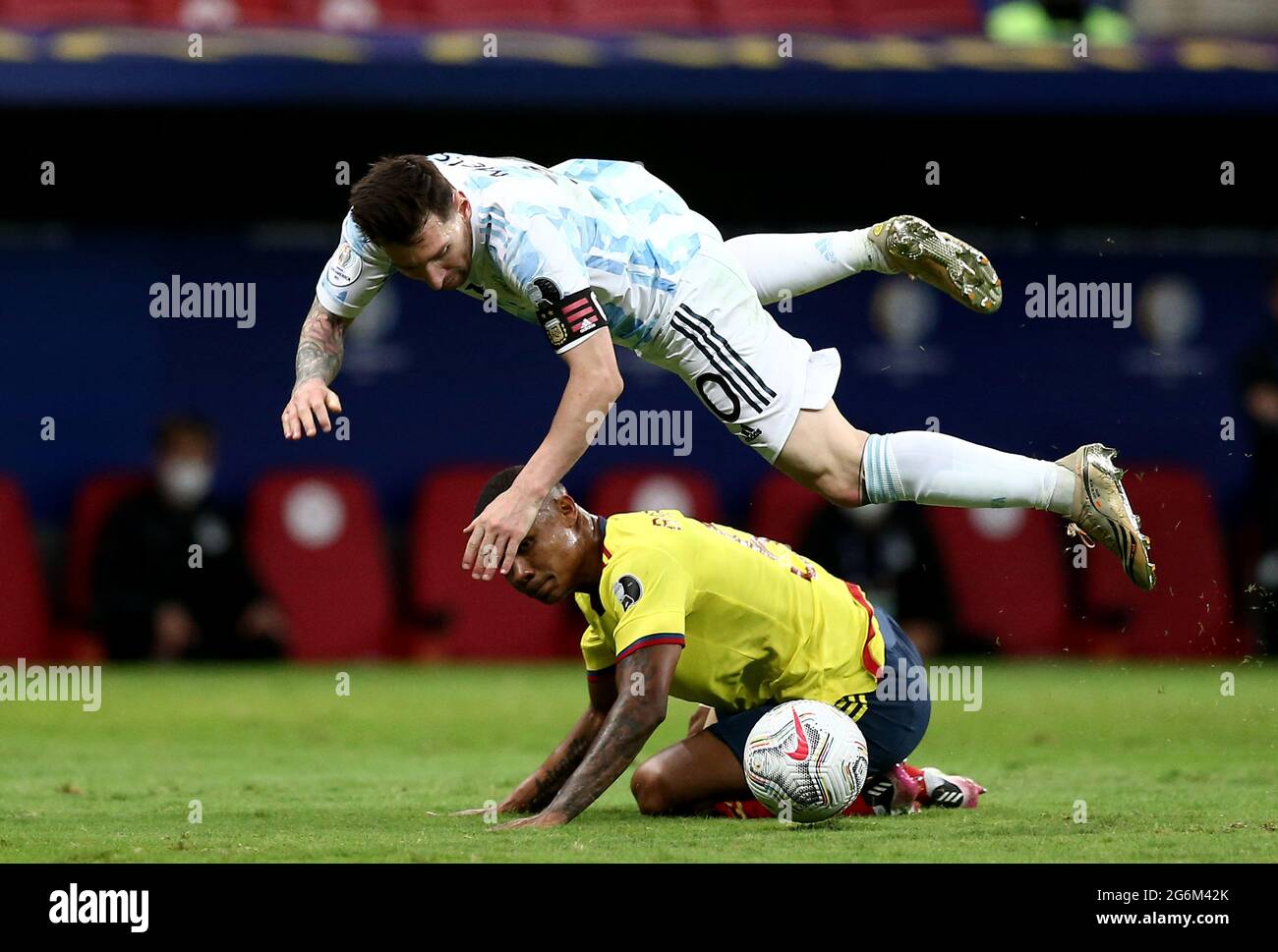 BRASILIA, BRAZIL - JULY 06: Lionel Messi of Argentina competes for the ball with Wilmar Barrios of Colombia ,during the Semifinal match between Argentina and Colombia as part of Conmebol Copa America Brazil 2021 at Mane Garrincha Stadium on July 6, 2021 in Brasilia, Brazil. (MB Media) Stock Photo
