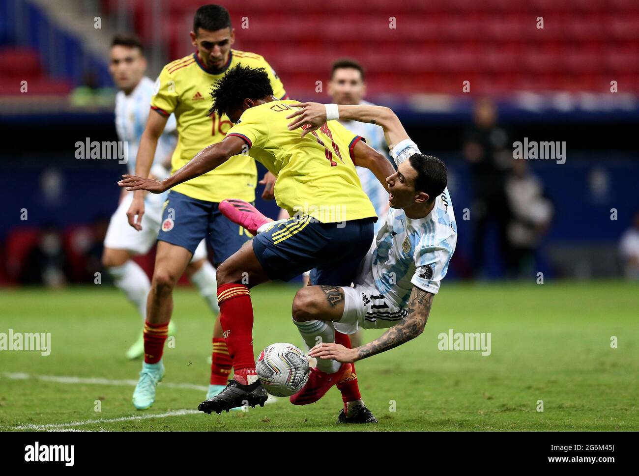 BRASILIA, BRAZIL - JULY 06: Angel Di Maria of Argentina competes for the ball with Juan Cuadrado and Rafael Santos Borre of Colombia ,during the Semifinal match between Argentina and Colombia as part of Conmebol Copa America Brazil 2021 at Mane Garrincha Stadium on July 6, 2021 in Brasilia, Brazil. (MB Media) Stock Photo