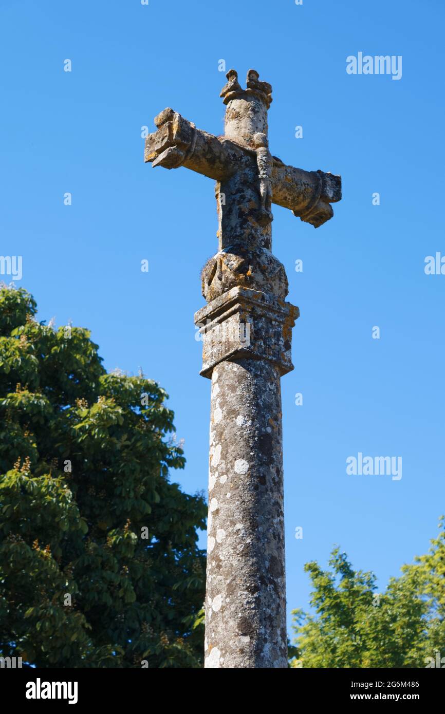 Cross in cemetery of Saint-Quentin Church, Nucourt, Val d'Oise, France Stock Photo