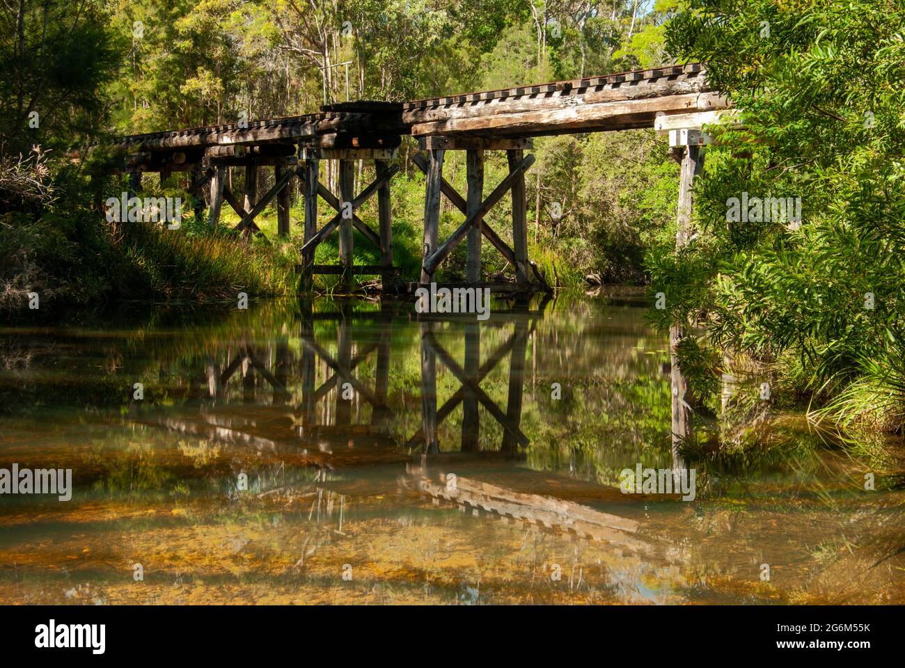 Railway Trestle Bridge, wooden, reflection, Moomin,  Atherton Tablelands. Stock Photo