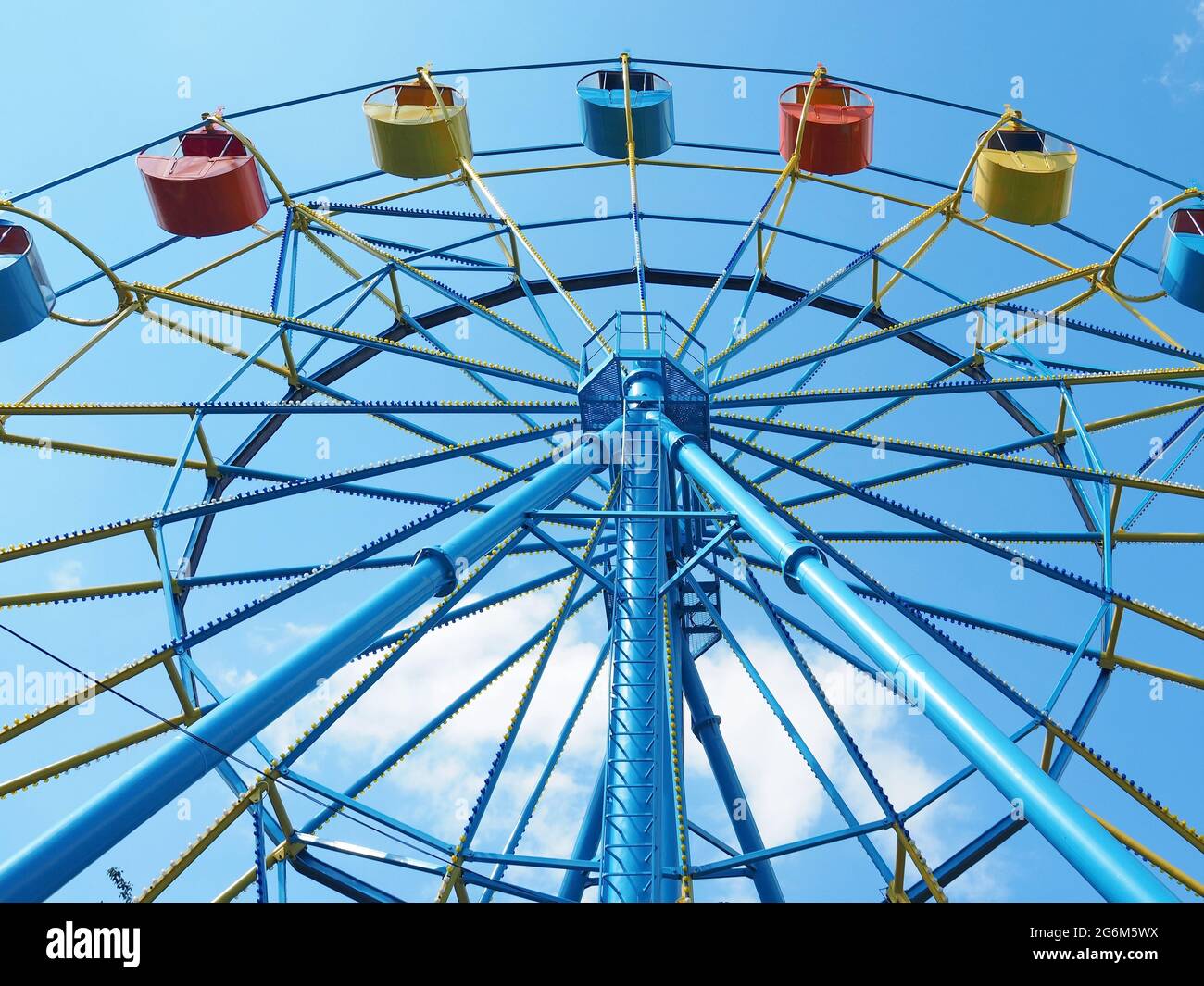 Multicolored open cabins on a ferris wheel close up Stock Photo