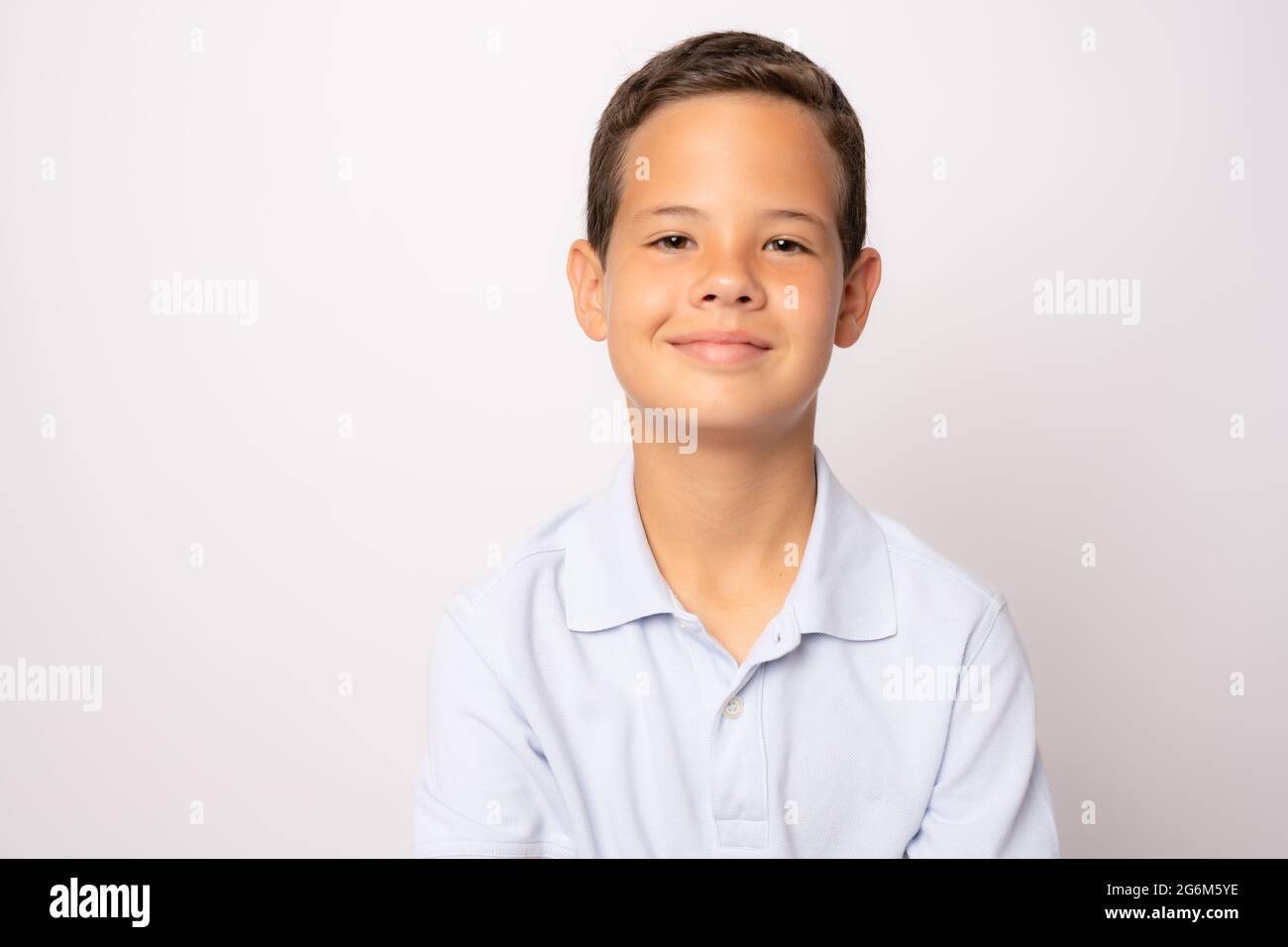 Photo of adorable young happy boy looking at camera Stock Photo - Alamy