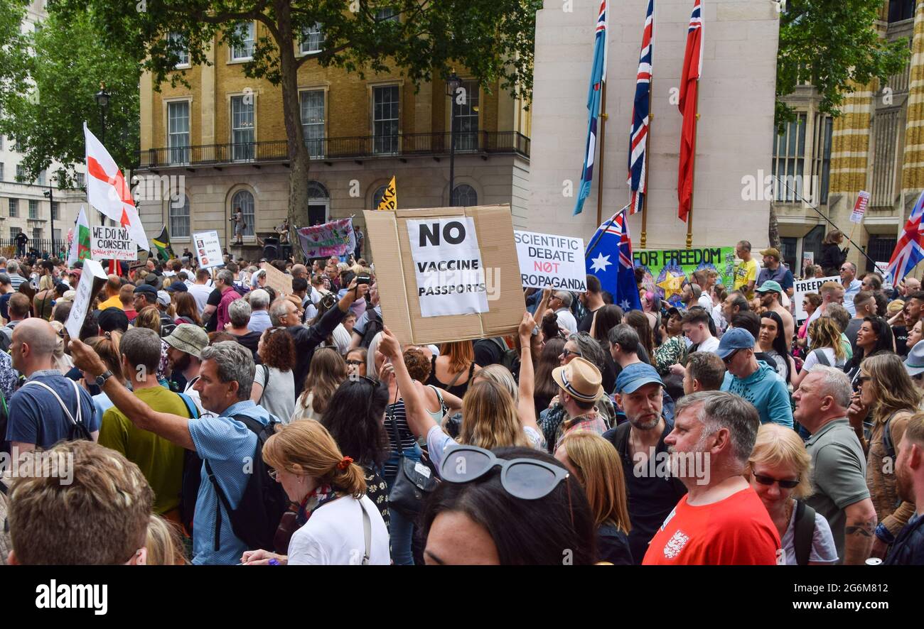 London, United Kingdom. 26th June 2021. Anti-lockdown and anti-vaccination demonstrators gathered outside Downing Street, in protest against further lockdowns, protective face masks and COVID-19 vaccinations. Stock Photo