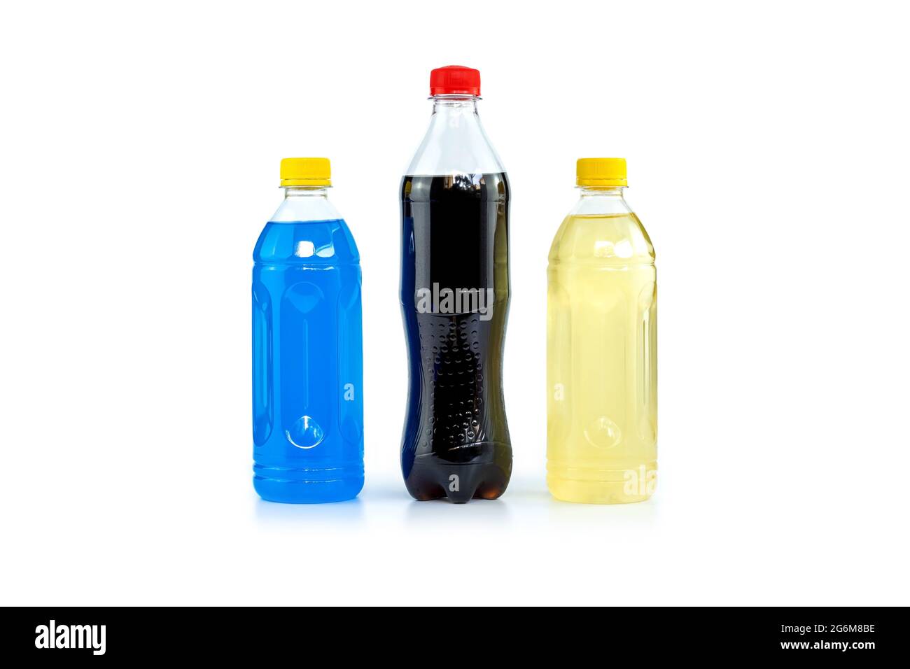 Multi colored drinks in plastic bottles isolated on white background. Stock Photo
