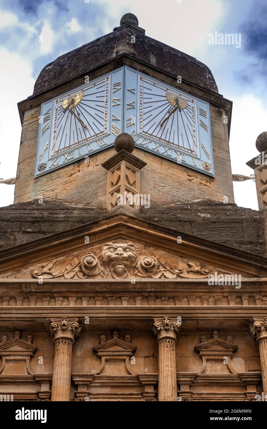 Six sided vertical sundial at the Gate of Honour at Caius Court Gonville and Caius College Cambridge University in Senate House Passage Cambridge. The Stock Photo