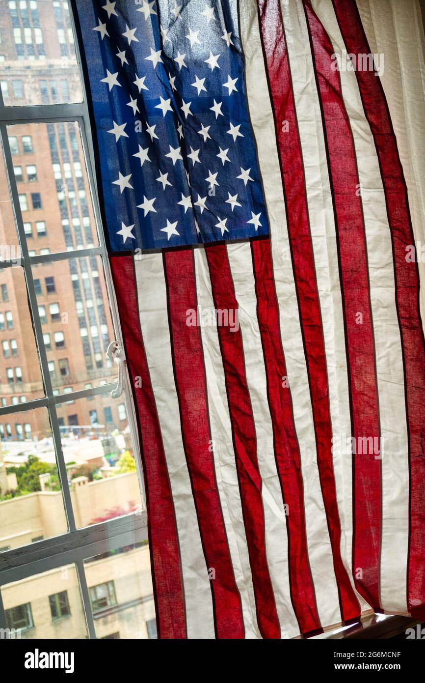 View of American Flag Displayed on Fourth of July in a New York City apartment ...