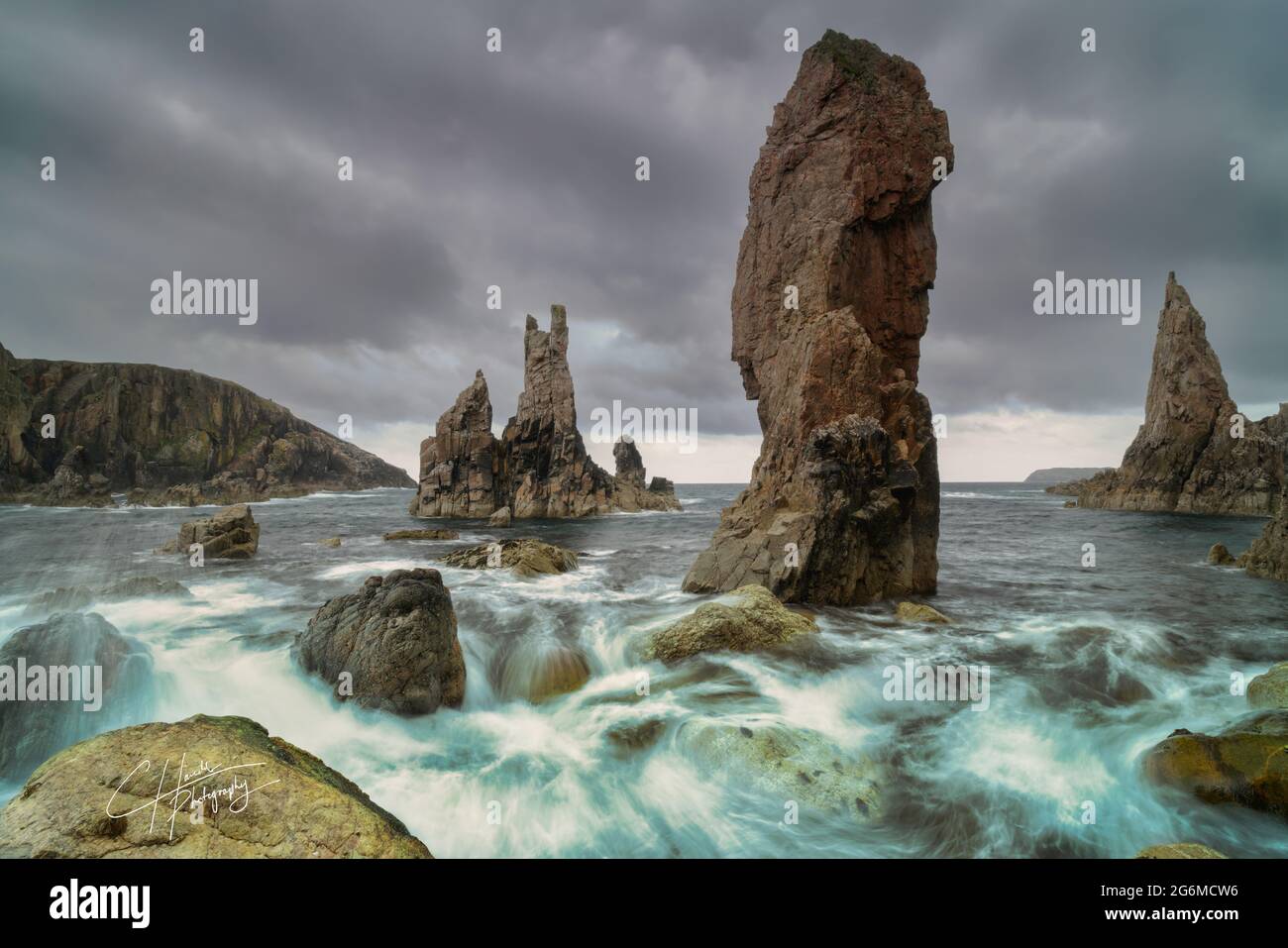 Mangersta sea stacks with sea motion blur,  located on the isle of Lewis, Outer Hebrides, Scotland. Stock Photo