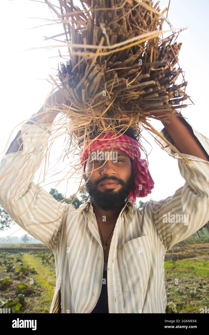 Man Carrying Bundle High Resolution Stock Photography and Images - Alamy