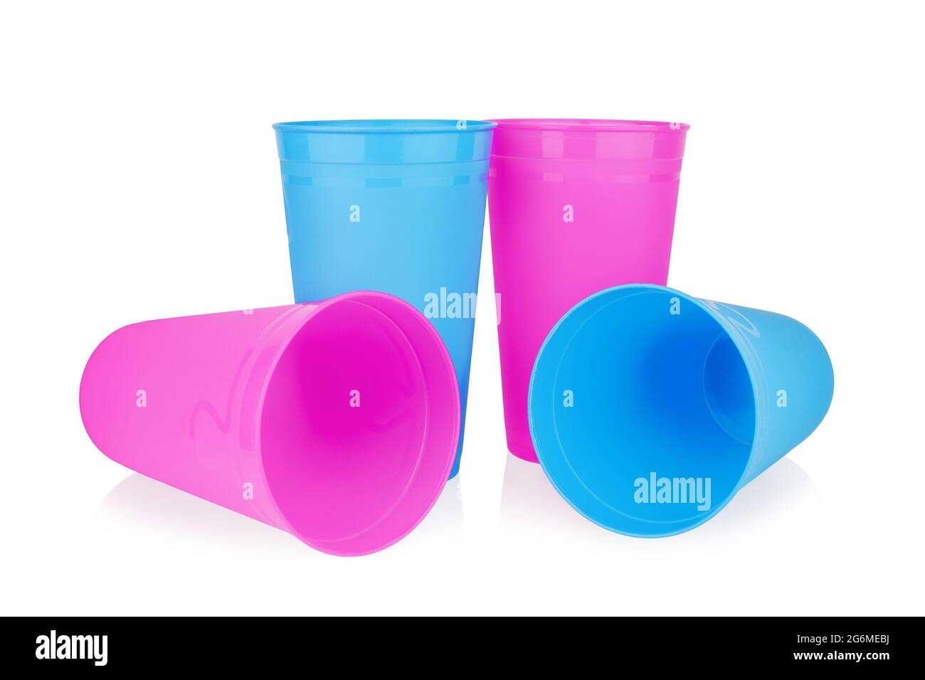Blue pink empty plastic cups white background isolated close up, four disposable blank drinking glasses, party beverage, cocktail, water, fruit juice Stock Photo