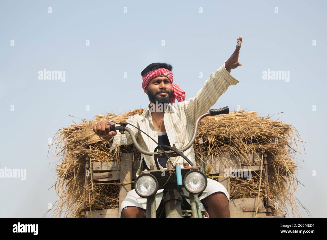 Young Adult man driving machine rickshaw Stock Photo