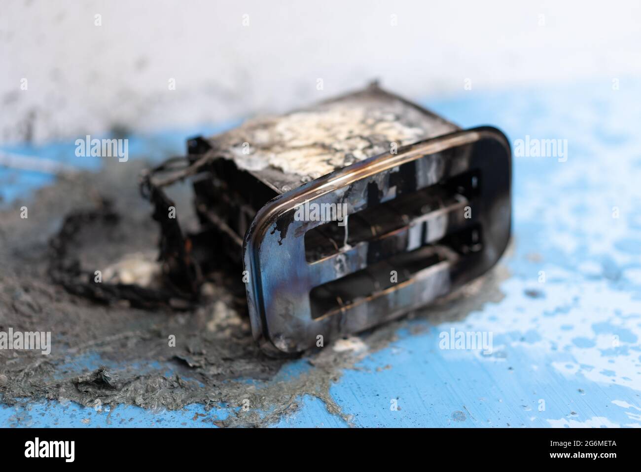Toaster after fire. Household electrical appliance fire hazard