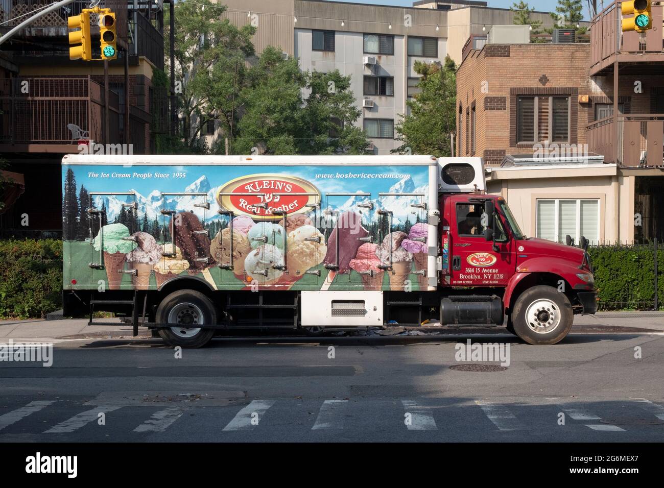 A Kosher ice cream delivery truck makes a delivery on Bedford Avenue in Williamsburg, Brooklyn, a neighborhood with a preponderance of orthodox Jews. Stock Photo