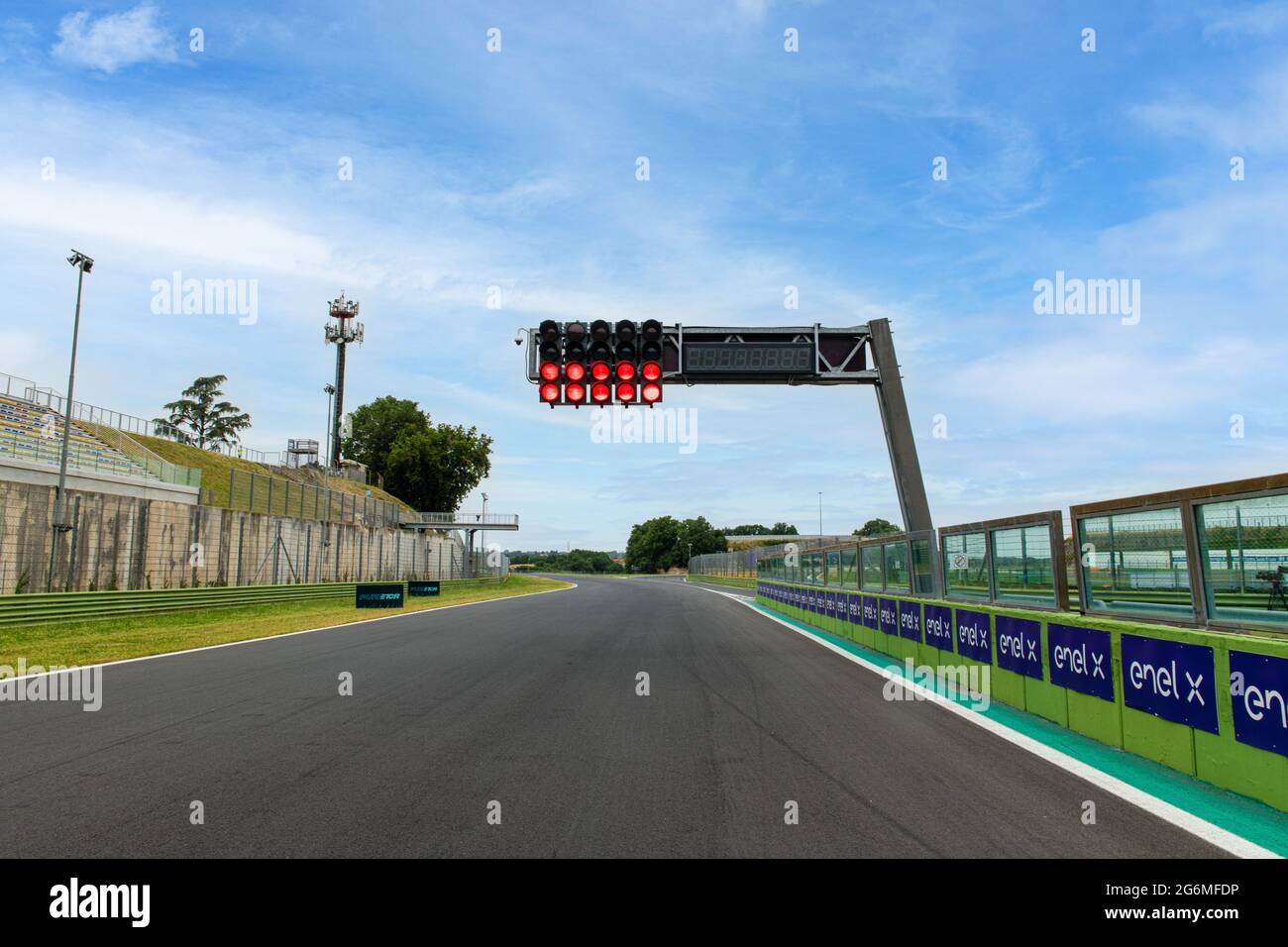 Vallelunga, Italy, June 19 2021, Pure ETCR Championship. Red light signpost on empty asphalt straight track, stop and warning concept Stock Photo