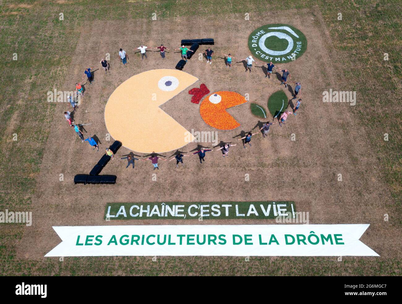 France, July 6, 2021,  Charpey (26), July 6, 2021: aerial view of a fresco produced by Drôme farmers during the 2021 Tour de France, Drômec's slogan, it's my nature, the chain, it's life and drawing of Pac- Man. Photo by Delmarty J/ANDBZ/ABACAPRESS.COM Stock Photo