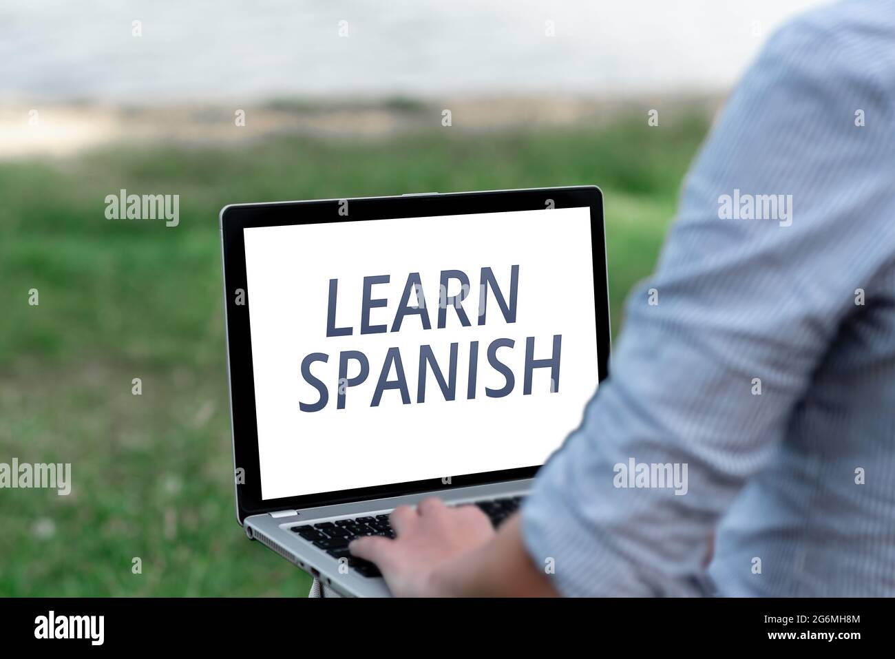 Conceptual caption Learn Spanish. Business idea to train writing and