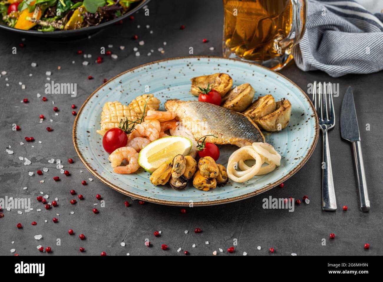 Mixed seafood platter with fish, squid, octopus, mussels and shrimp