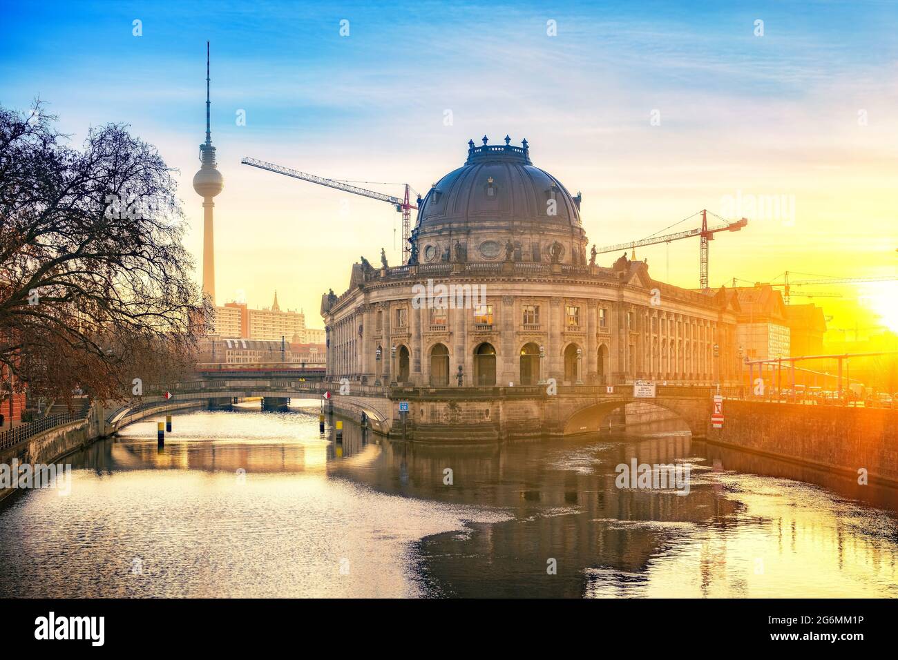 Museum Island on Spree river and TV tower in the background at sunrise, Berlin, Germany Stock Photo