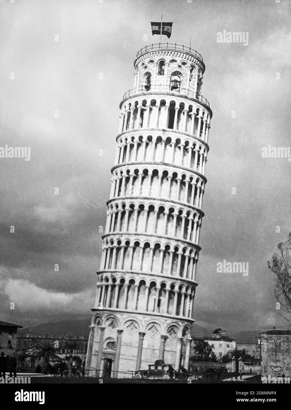 An early 20th century vintage black and white photograph of the leaning tower of Pisa in Italy. Stock Photo