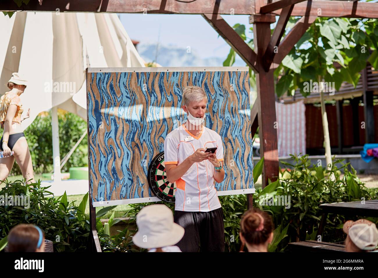 Kemer, Turkey May 25, 2021 children learn to play darts on the