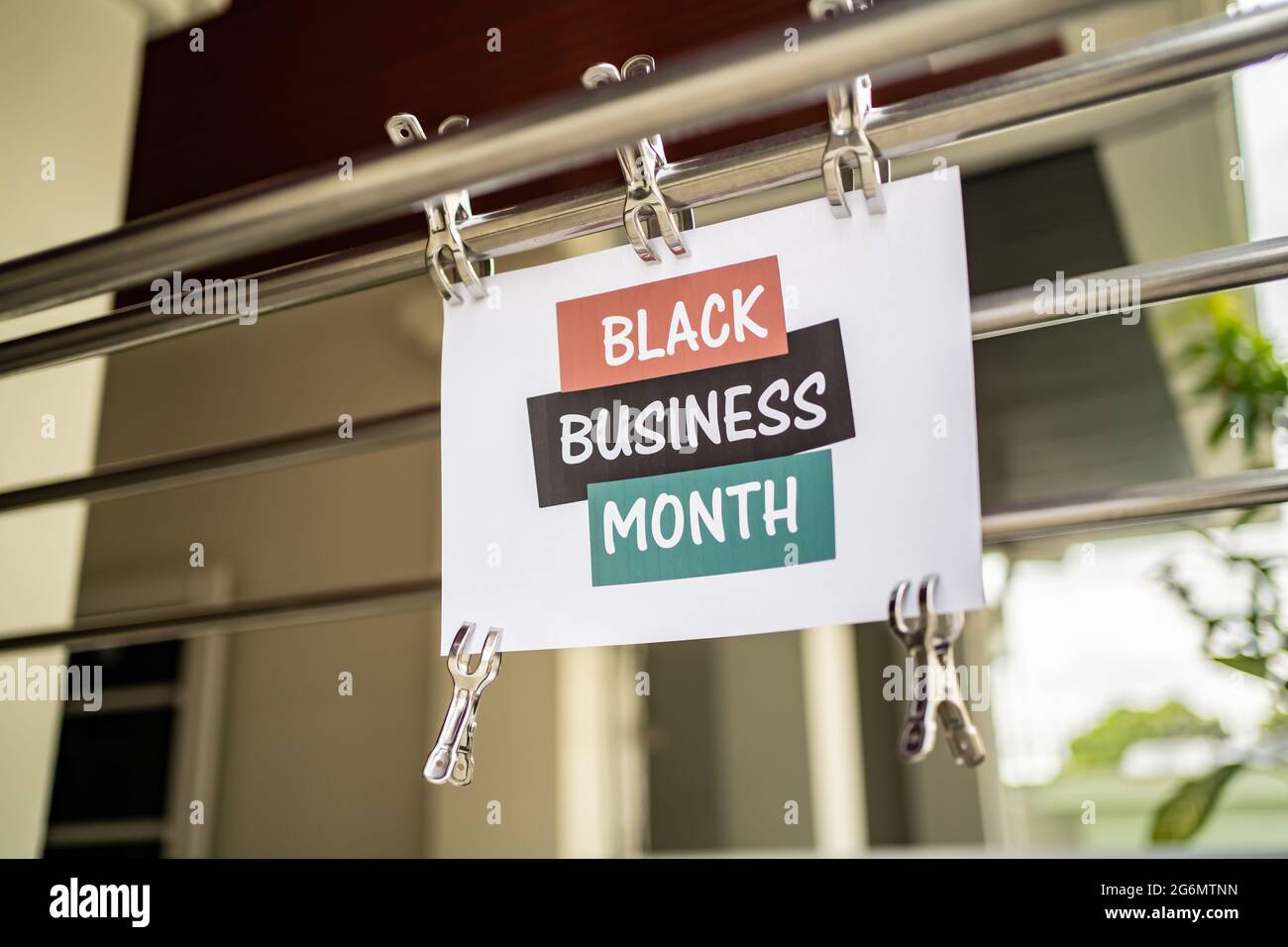 Black business month sign were attached in the public space Stock Photo