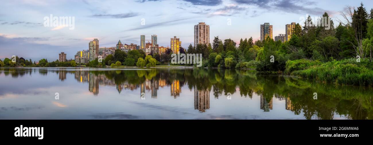 View of Lost Lagoon in famous Stanley Park in a modern city Stock Photo