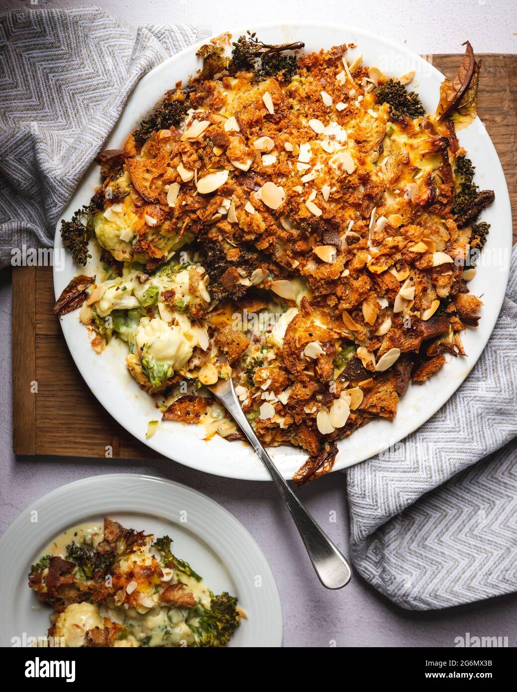Cauliflower casserole with cheesy breadcrumb and almond topping Stock Photo