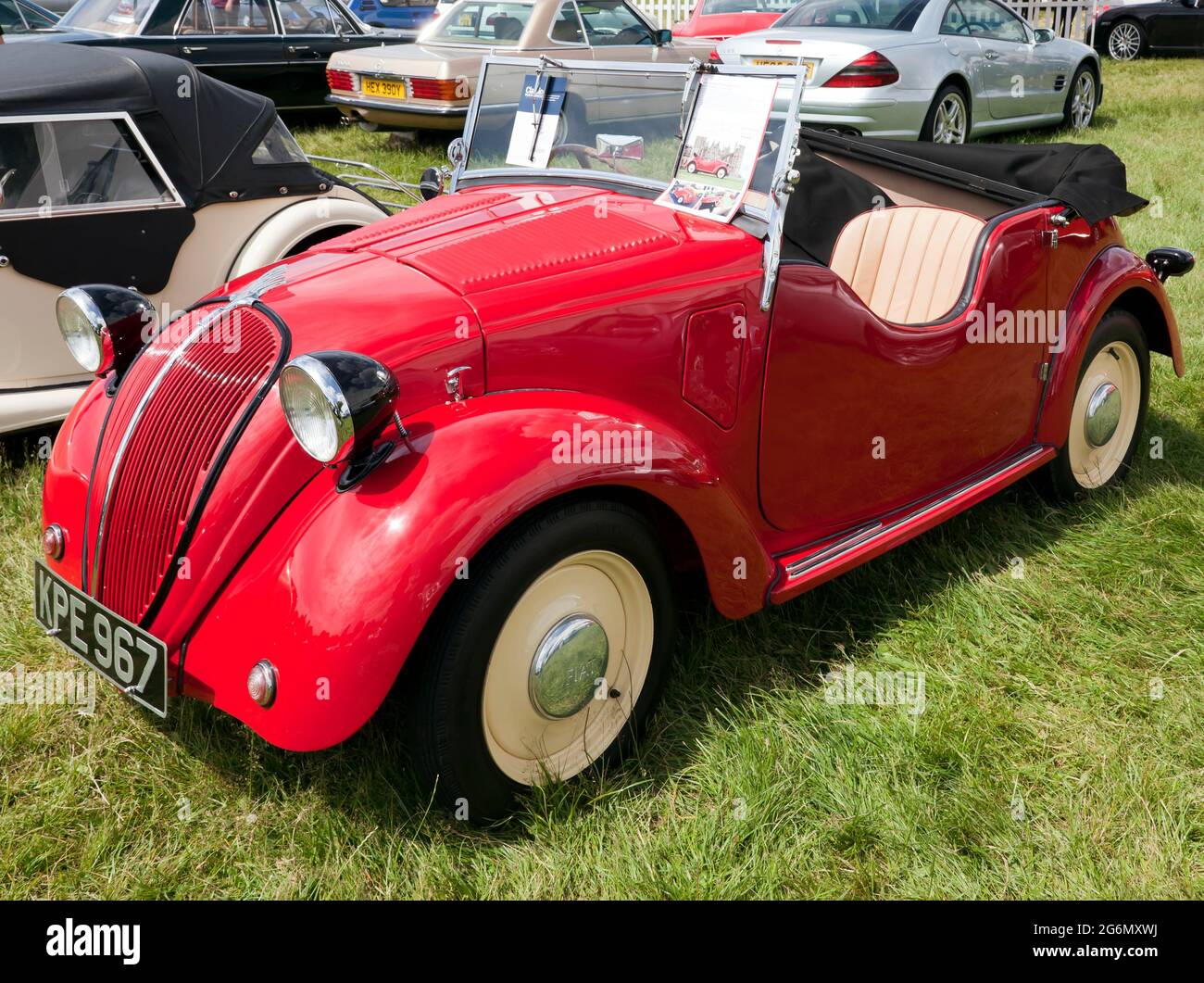 View of a Red,  1938 Fiat 500 Topolino Smith Special, for auction, at the 2021 London Classic Car Show Stock Photo