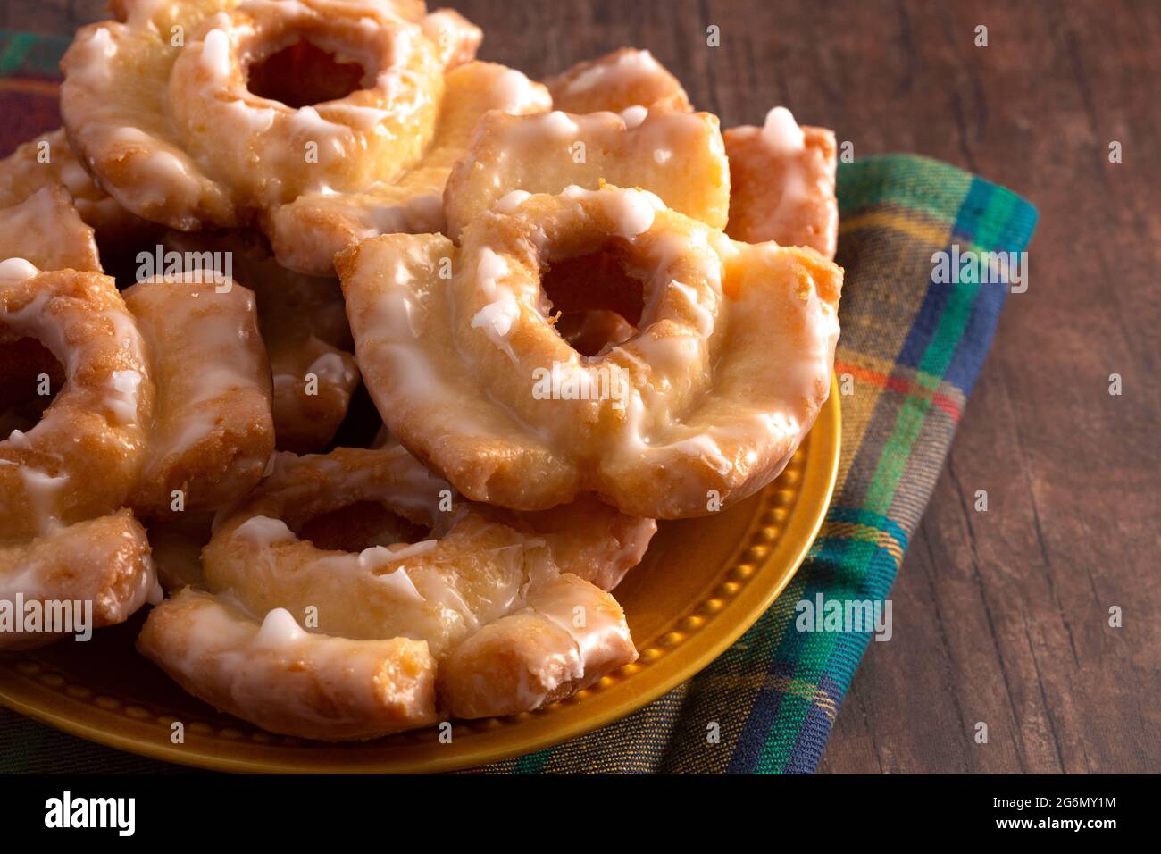Old Fashioned Donuts on a Rustic Wooden Farm Table Stock Photo
