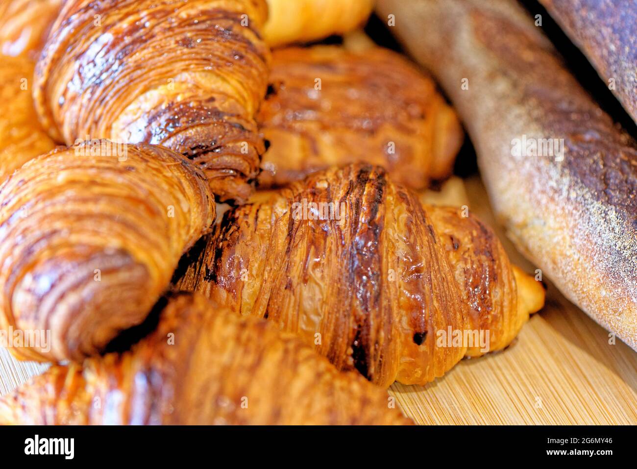 Assortment of Pastries Croissants, Pains au Chocolat and French baguettes -  French bakery Stock Photo - Alamy