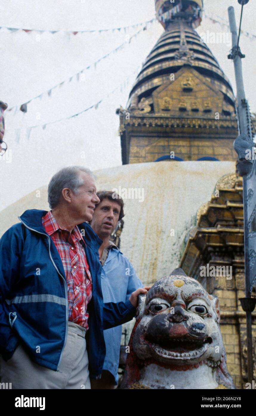 Former U.S. President Jimmy Carter, left, with Investment Banker Richard Blum, husband of Senator Dianne Feinstein, tour the Swayambhu Stupa, known as the Monkey Temple October 18, 1985 in Kathmandu, Nepal. Carter his wife, Rosalynn, and Blum will spend 13-days trekking in the Himalayas. Stock Photo