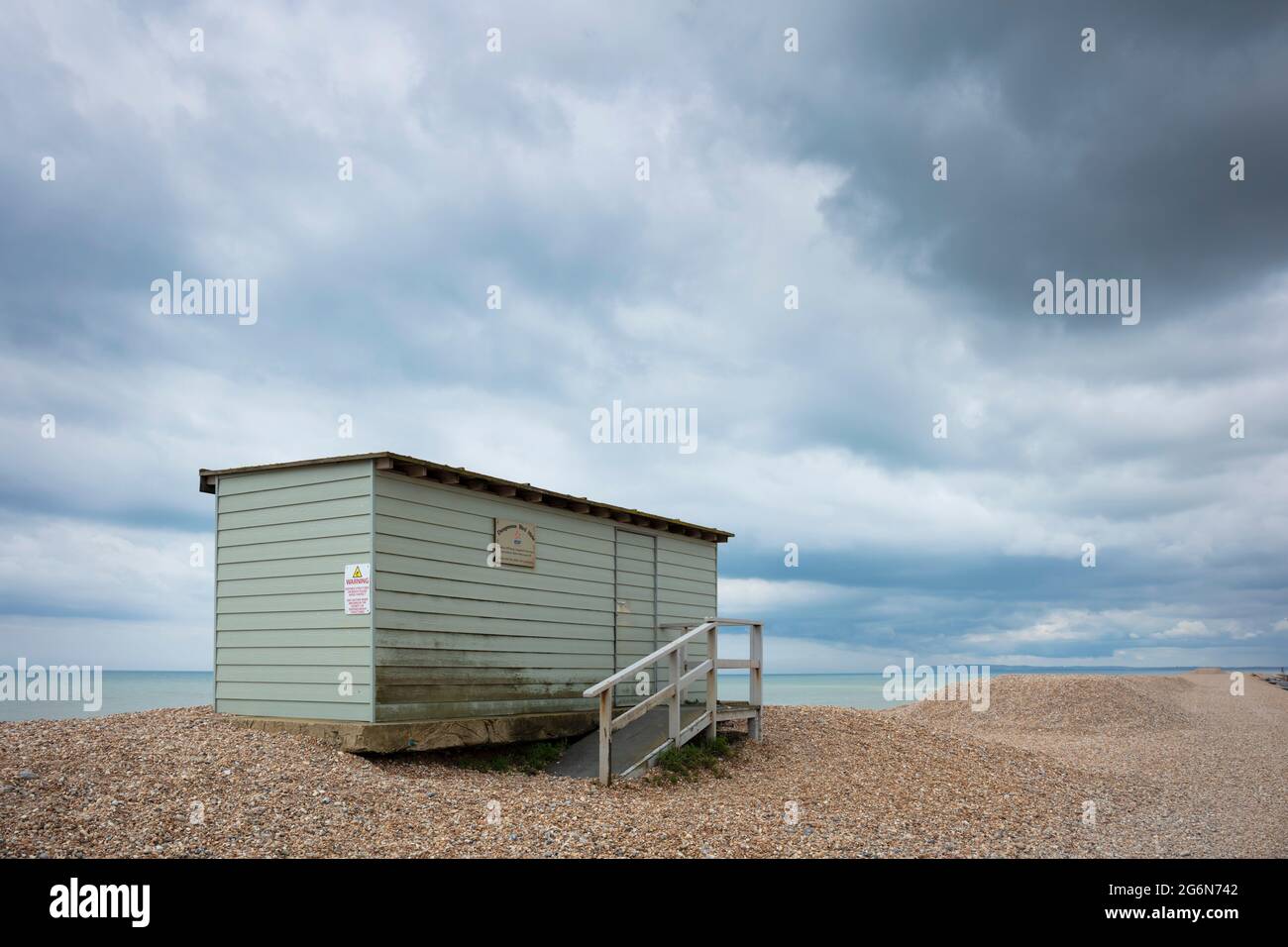 Dungeness bird Hide a Green hut on the shingle beach at Dungeness National Nature Reserve Kent England UK GB Europe Stock Photo