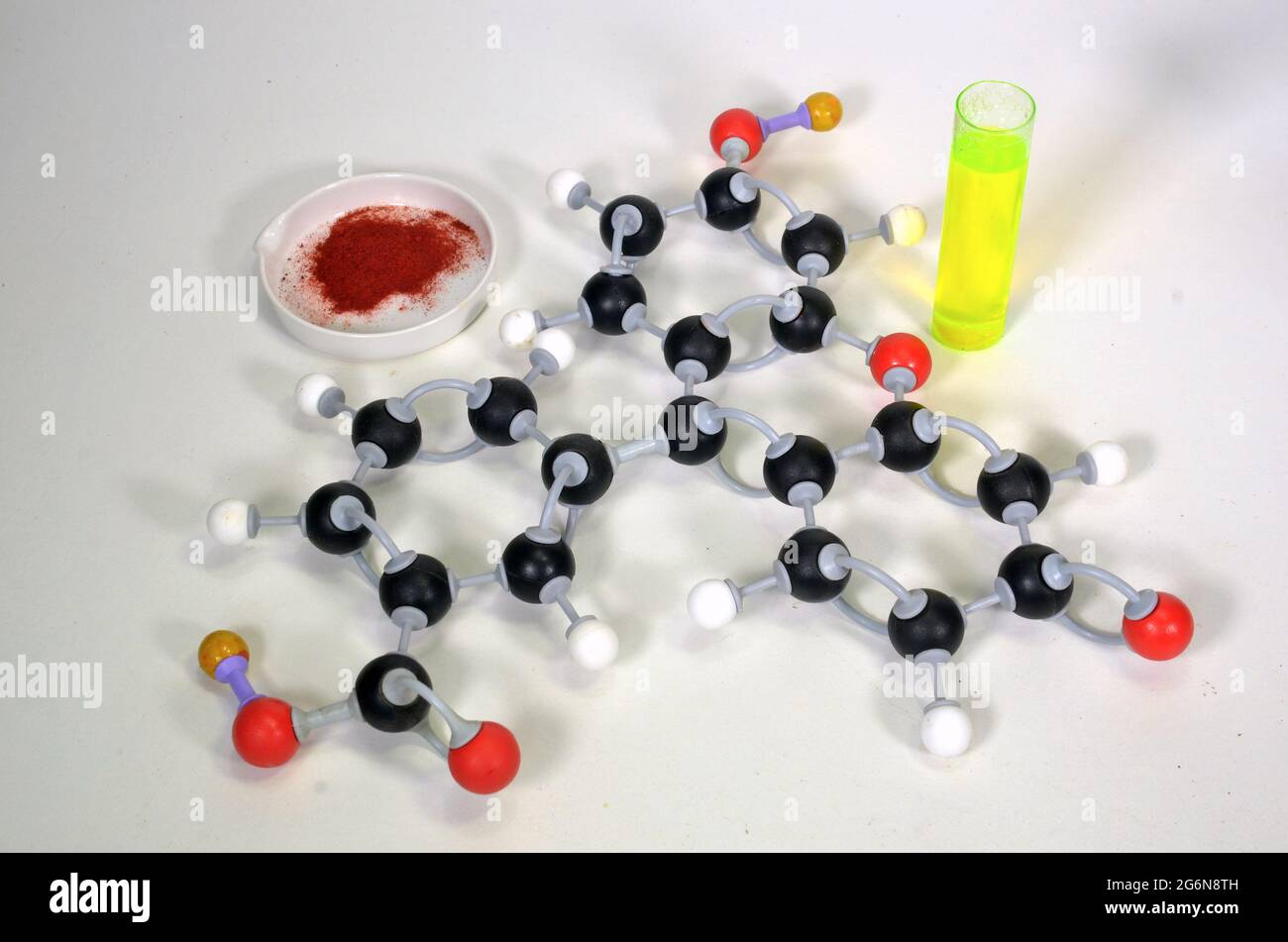 Molecule model of Uranin, this pigment is an orange powder but becomes green when dissolved in water. White is hydrogen, black is carbon, red is oxyge Stock Photo