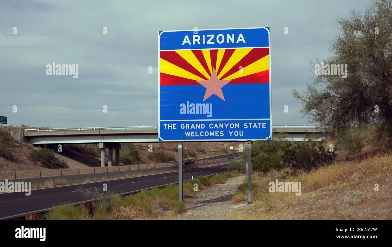 Welcome to Arizona road sign on the State border Route, US. The grand canyon state welcomes you. Stock Photo