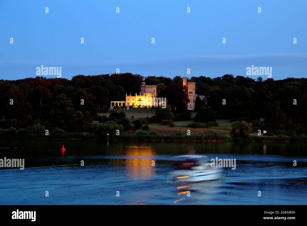 View from Glienicke Bridge to Babelsberg Palace during the evening Stock Photo