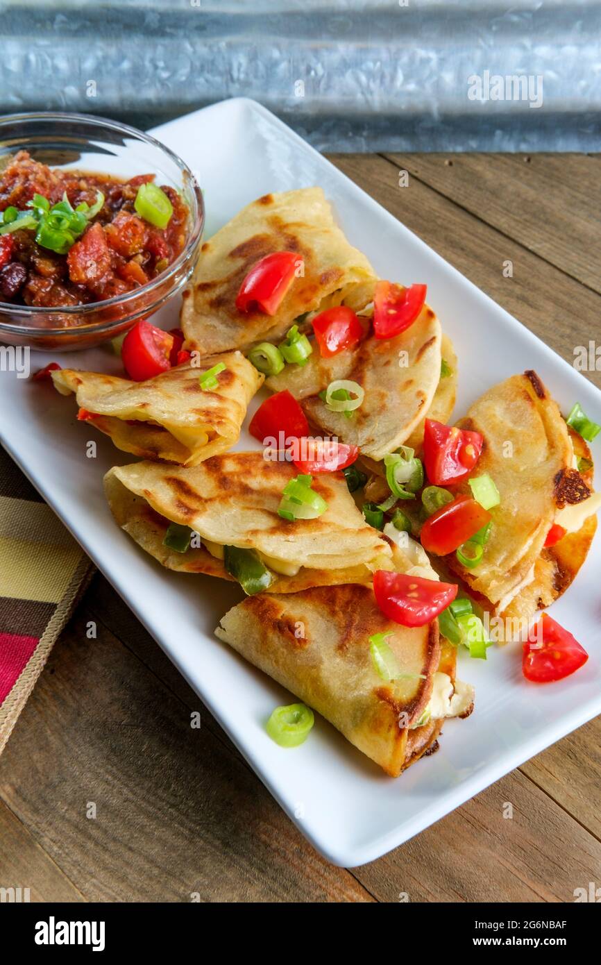 Vegetarian Mexican pepper jack cheese quesadillas with black bean salsa