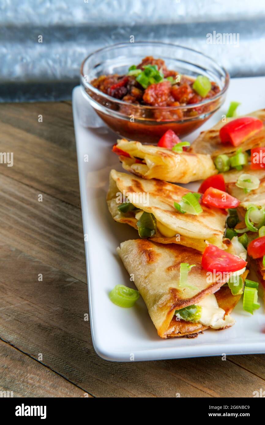 Vegetarian Mexican pepper jack cheese quesadillas with black bean salsa