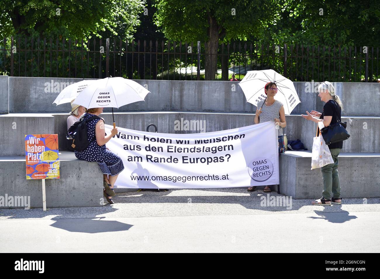 Vienna, Austria. Grandmas against the right protest in front of the Federal Chancellery. Banner with the inscription 'When do we get people out of the Stock Photo